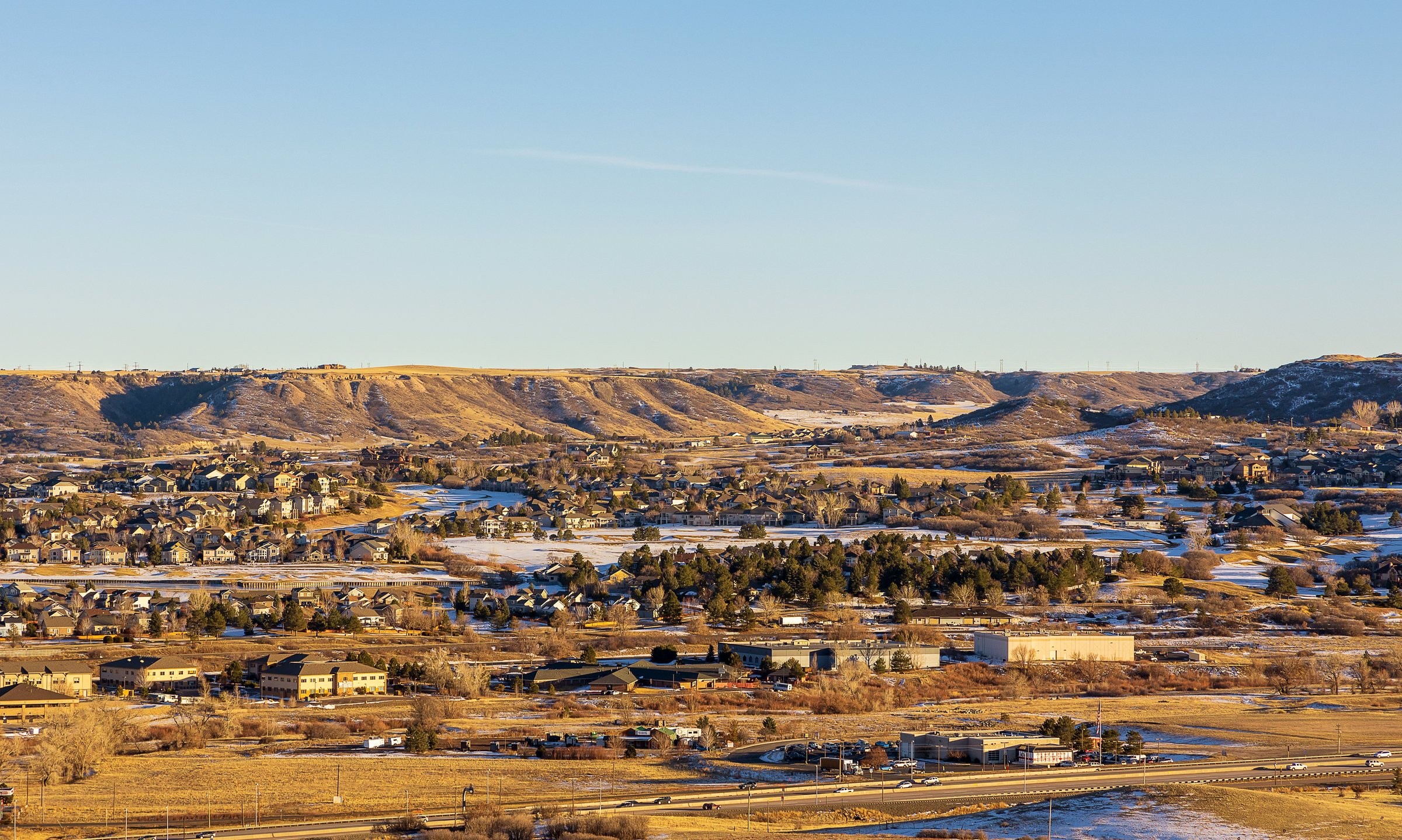 Parker, Colorado neighborhoods in winter with the Front Range behind